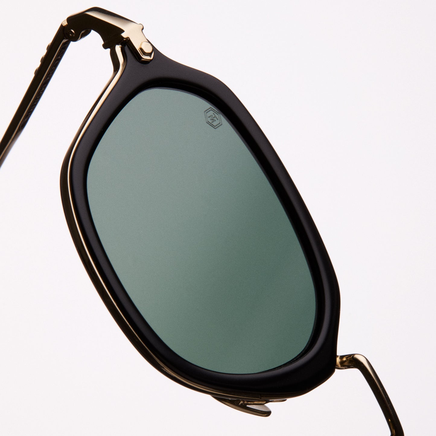 sunglasses with black frame and gold accents, geometric shape