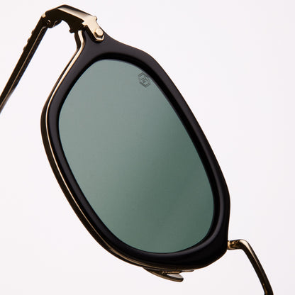 sunglasses with black frame and gold accents, geometric shape